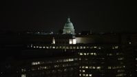 4.8K stock footage aerial video of the United States Capitol dome and office buildings in Washington, D.C., night Aerial Stock Footage | AX77_046