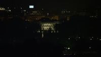 4.8K stock footage aerial video of The White House seen from the base of the Washington Monument, Washington, D.C., night Aerial Stock Footage | AX77_047E