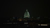 4.8K stock footage aerial video of the United States Capitol building in Washington, D.C., night Aerial Stock Footage | AX77_054