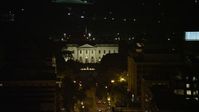 4.8K stock footage aerial video of The White House, tilt to reveal Washington Monument and Jefferson Memorial, Washington, D.C., night Aerial Stock Footage | AX77_065