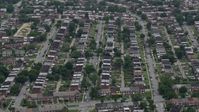 4.8K stock footage aerial video approaching urban row houses in Baltimore, Maryland Aerial Stock Footage | AX78_121