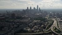 4.8K stock footage aerial video tilting from Benjamin Franklin Bridge to reveal skyline of Downtown Philadelphia, Pennsylvania Aerial Stock Footage | AX79_004E