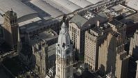 4.8K stock footage aerial video William Penn statue atop Philadelphia City Hall, Pennsylvania Aerial Stock Footage | AX79_014E