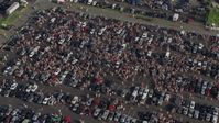 4.8K stock footage aerial video of crowds tailgaiting  in a parking lot, Campbell's Field, Camden, New Jersey Aerial Stock Footage | AX79_091E