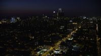 4.8K stock footage aerial video of Downtown Philadelphia skyline and Broad Street leading to City Hall, Pennsylvania, Night Aerial Stock Footage | AX81_045