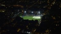 4.8K stock footage aerial video of baseball field in an urban neighborhood in South Philadelphia, Pennsylvania, Night Aerial Stock Footage | AX81_060