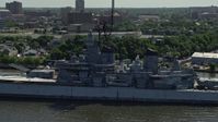 4.8K stock footage aerial video flying by the battleship USS New Jersey, Camden, New Jersey Aerial Stock Footage | AX82_001