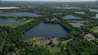 4.8K stock footage aerial video flying over small lakes and lakeside homes in Morrisville, Pennsylvania Aerial Stock Footage | AX82_055