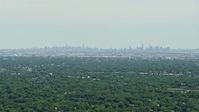 4.8K stock footage aerial video of a distant view of Lower and Midtown Manhattan, New York seen from New Jersey  Aerial Stock Footage | AX83_062