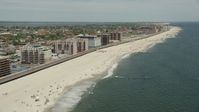 4.8K stock footage aerial video flying by Beachfront Condominiums, Long Beach, New York Aerial Stock Footage | AX83_240