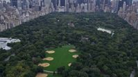 4K stock footage aerial video Flying over Central Park, revealing Midtown Manhattan, New York, New York Aerial Stock Footage | AX84_043