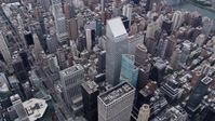 4K stock footage aerial video fly over Midtown Manhattan skyscrapers, reveal Citigroup Center, New York City Aerial Stock Footage | AX84_064E