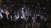 4K stock footage aerial video Times Square, skyscrapers, Midtown Manhattan, New York, New York, night Aerial Stock Footage | AX85_041