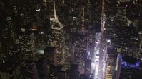 4K stock footage aerial video Bank of America Tower, Times Square, Midtown Manhattan, New York, night Aerial Stock Footage | AX85_073