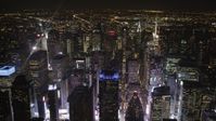 4K stock footage aerial video Times Square skyscrapers, Midtown Manhattan, New York, New York, night Aerial Stock Footage | AX85_075