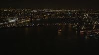 4K stock footage aerial video Approaching Brooklyn Bridge, New York, New York, night Aerial Stock Footage | AX85_127