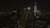 4K stock footage aerial video Fly by One World Trade Center, Lower Manhattan, New York, New York, night Aerial Stock Footage | AX85_130