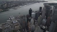 4K stock footage aerial video Panning right from East River to Lower Manhattan, New York, New York Aerial Stock Footage | AX87_037