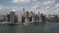 4K stock footage aerial video Approaching Lower Manhattan skyscrapers on the shore, New York, New York Aerial Stock Footage | AX87_047