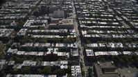 4K stock footage aerial video of flying over row houses in urban neighborhoods, Brooklyn, New York Aerial Stock Footage | AX88_017