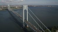 4K aerial stock footage video of passing by Verrazano-Narrows Bridge, seen from Staten Island, New York, New York Aerial Stock Footage | AX88_082