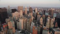 4K stock footage aerial video Fly over Lower Manhattan, approach 40 Wall Street, New York, New York, sunset Aerial Stock Footage | AX89_005