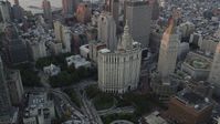 4K stock footage aerial video Flying by Manhattan Municipal Building, Lower Manhattan, New York, sunset Aerial Stock Footage | AX89_008