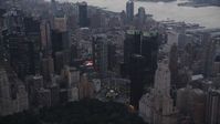 4K stock footage aerial video Flying by Columbus Circle, revealing Times Square, New York, New York, twilight Aerial Stock Footage | AX89_069