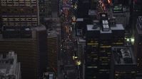 4K stock footage aerial video Fly over 7th Avenue, reveal Times Square, Midtown Manhattan, New York, twilight Aerial Stock Footage | AX89_072