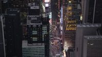 4K stock footage aerial video Approaching Times Square, Midtown Manhattan, New York, twilight Aerial Stock Footage | AX89_074