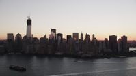 4K stock footage aerial video Approaching Lower Manhattan skyline, New York, New York, sunrise Aerial Stock Footage | AX90_003