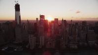 4K stock footage aerial video Flying by Lower Manhattan skyscrapers, New York, New York, sunrise Aerial Stock Footage | AX90_010