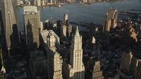 4K stock footage aerial video Flying by Woolworth Building, Lower Manhattan, New York, New York, sunrise Aerial Stock Footage | AX90_118