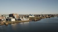 4K stock footage aerial video Flying by industrial buildings, Newark, New Jersey, sunrise Aerial Stock Footage | AX90_174