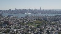 4K stock footage aerial video of the Midtown Manhattan skyline and Hudson River, New York, seen from Union City, New Jersey Aerial Stock Footage | AX91_001