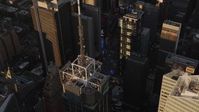 4K stock footage aerial video Flying by Times Square, Midtown Manhattan skyscrapers, New York, sunset Aerial Stock Footage | AX93_047