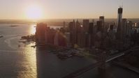 4K stock footage aerial video Approaching Lower Manhattan, East River, New York, New York, sunset Aerial Stock Footage | AX93_066