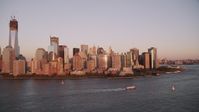 4K stock footage aerial video Flying by Lower Manhattan skyline, Hudson River, New York, New York, sunset Aerial Stock Footage | AX93_104