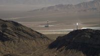 HD stock footage aerial video of three solar towers at the Ivanpah Solar Electric Generating System, Mojave Desert, California Aerial Stock Footage | CAP_005_010