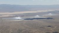 HD stock footage aerial video of the power towers and mirror arrays of the Ivanpah Solar Electric Generating System in California Aerial Stock Footage | CAP_006_032