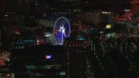 HD stock footage aerial video of a Ferris wheel at nighttime, Downtown Atlanta, Georgia Aerial Stock Footage | CAP_013_060