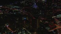 HD stock footage aerial video of an approach to SunTrust Plaza and city buildings at night, Downtown Atlanta, Georgia Aerial Stock Footage | CAP_013_070