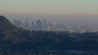 HD stock footage aerial video of a wide view of the city's skyline on a hazy day in Downtown Los Angeles, California Aerial Stock Footage | CAP_016_038