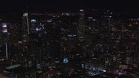 HD stock footage aerial video circling US Bank Tower and the city's skyline at night in Downtown Los Angeles, California Aerial Stock Footage | CAP_018_181