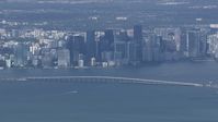 HD stock footage aerial video of the city's skyline behind the Rickenbacker Causeway, Miami, Florida Aerial Stock Footage | CAP_020_042