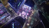 5K stock footage aerial video orbiting bird's eye view of the Christmas fair at Nokia Theater at night, Los Angeles, California Aerial Stock Footage | DCA01_036