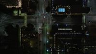 5K stock footage aerial video bird's eye view following South Figueroa Street in Downtown Los Angeles at night, California Aerial Stock Footage | DCA01_040E