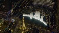 4K stock footage aerial video of orbiting The Bellagio fountain at the end of the show, Las Vegas, Nevada Night Aerial Stock Footage | DCA03_134