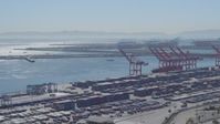 4K stock footage aerial video of flying by cargo containers, cranes at Port of Long Beach, California Aerial Stock Footage | DCA06_039
