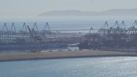 4K stock footage aerial video flyby cargo ships, containers and cranes, Port of Los Angeles, San Pedro, California Aerial Stock Footage | DCA06_042